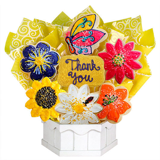Flower-shaped decorated cookies bouquet with a butterfly and 'Thank You' message in a white box