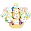 Decorative arrangement of baby blocks with personalized text in a bouquet format.