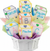 Decorative cookies shaped like baby blocks with personalized text in a white container.