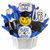Graduation-themed cookie bouquet with blue ribbons and 'Congrats Grad' sign.