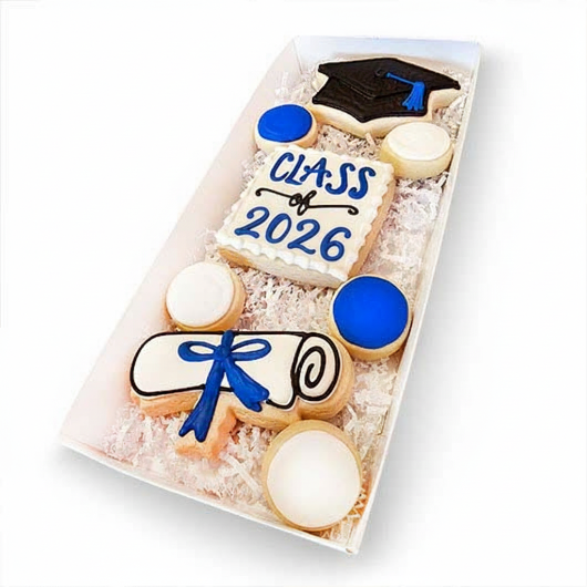 Graduation-themed cookies in a box with 'Class of 2025' text on a white background