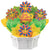 Birthday cookie bouquet with smiling sun cookies and cheerful yellow and green tissue paper.