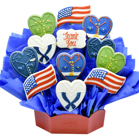 Patriotic cookie bouquet with American flag cookies, military uniform heart cookies, and a thank you message.
