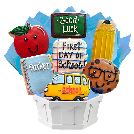 Back to school themed cookie bouquet with apple, school bus, pencil, and chalkboard cookies.