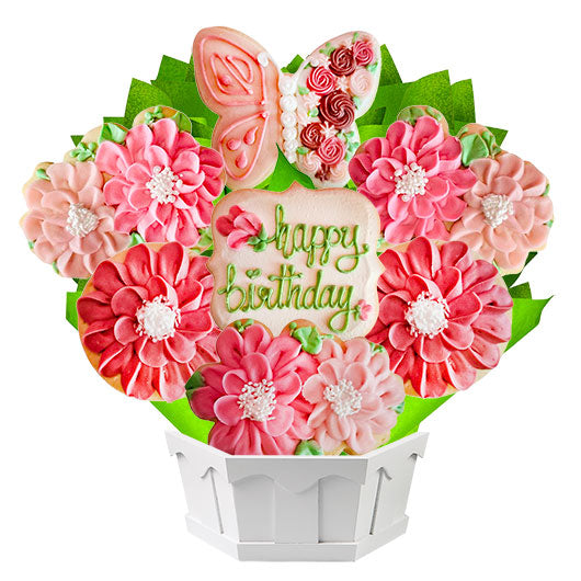 Pink floral cookie bouquet with butterfly and happy birthday message in white basket
