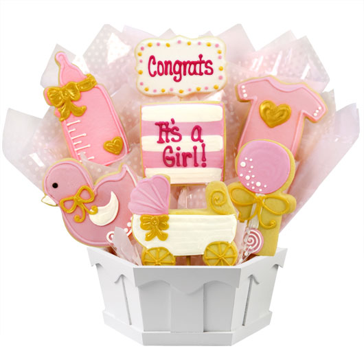 Pink baby girl cookie bouquet with onesie, bottle, carriage, and duck shapes in gift basket