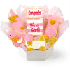 Decorative cookies in a box with 'Congrats It's a Girl!'