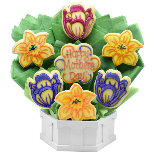 Mother's Day cookie bouquet with colorful flower-shaped decorated cookies in a white basket
