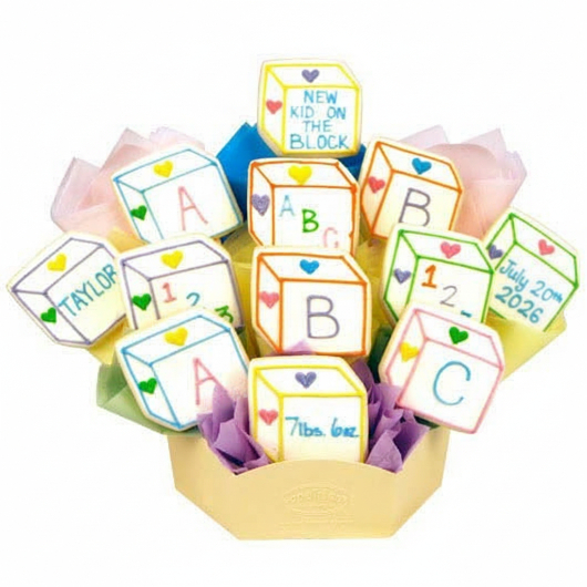 Decorative arrangement of baby blocks with personalized text in a bouquet format.