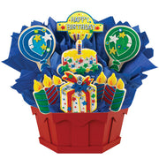 Birthday cookie bouquet with balloon, cake, candle, and present shaped cookies in red container