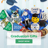 Graduation-themed decorations and cookies with 'Congrats Grad' and 'Class of 2026' text on a light blue background.