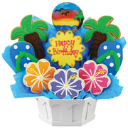 Birthday cookie bouquet with tropical palm tree, flower, and sunset decorated cookies