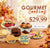 Promotional banner for gourmet cookies featuring an assortment of decorated cookies on plates and a wooden table, with autumn leaves and a warm indoor background. Large text reads 'GOURMET Cookies STARTING $29.