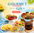 A promotional display of assorted gourmet cookies arranged on plates, stands, and a cutting board in a bright, tropical-themed setting. Large text reads 'GOURMET Cookies STARTING AT $29.